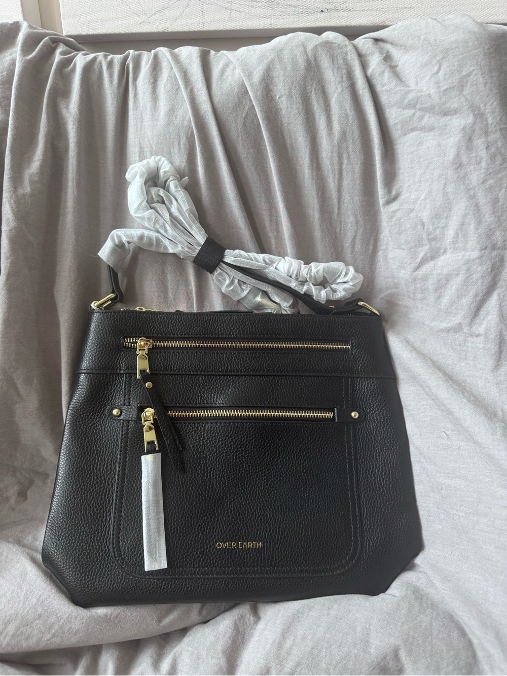 Over Earth Black Leather Crossbody Bag with Gold Hardware